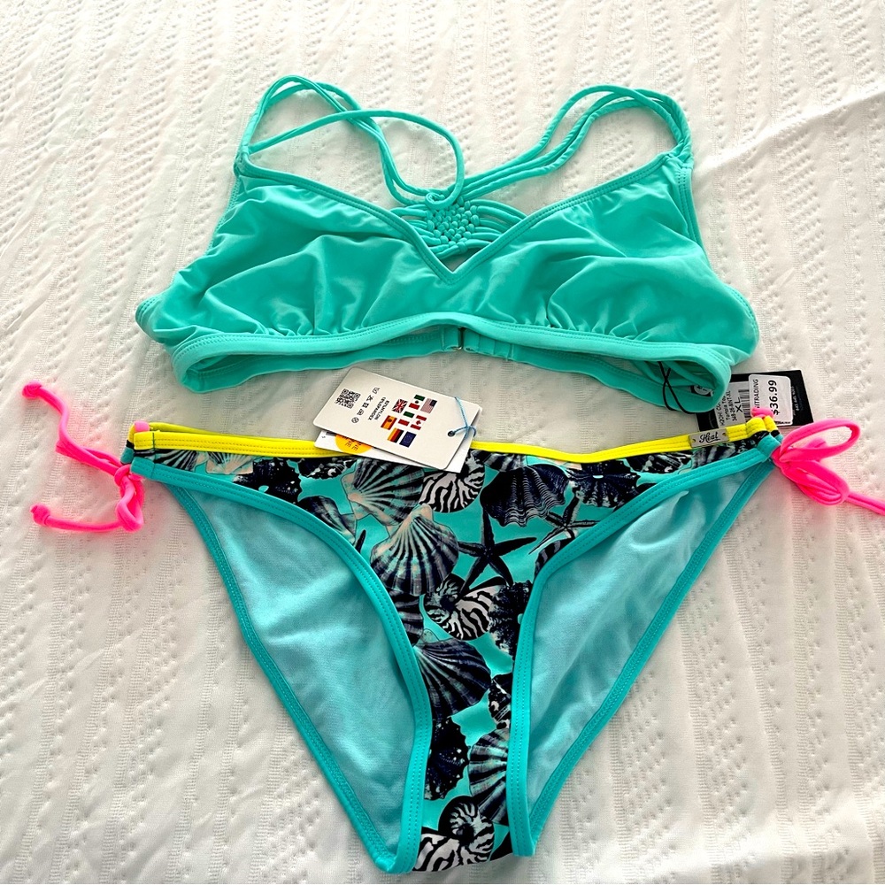 Woman’s bikini swimsuit size XL. Super cute and New With Tags. Smoke free home.